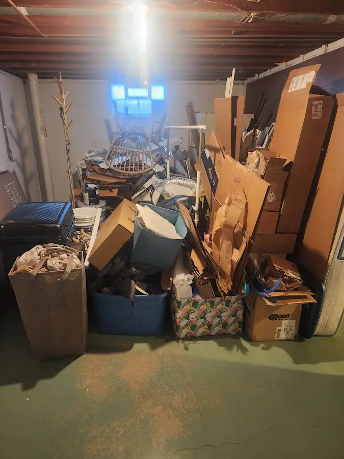 Roll-off dumpster container at job site for 15 Yard Dumpster Rental in Tomball